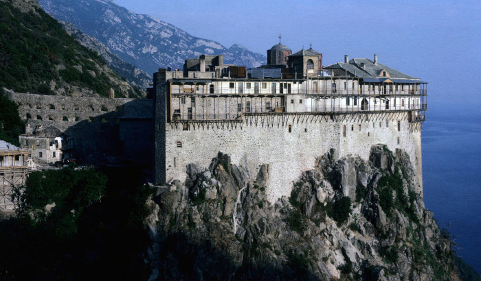photo of mount athos compound at the edge of a mountain