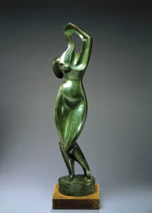 green woman sculpture