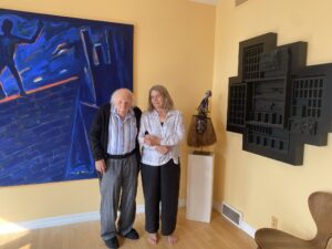 Willy Haeberli with his daughter, Frances, in his home.
